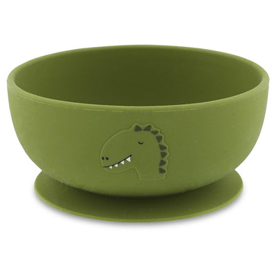 Green silicone bowl with suction base featuring a dinosaur design for toddlers and babies.