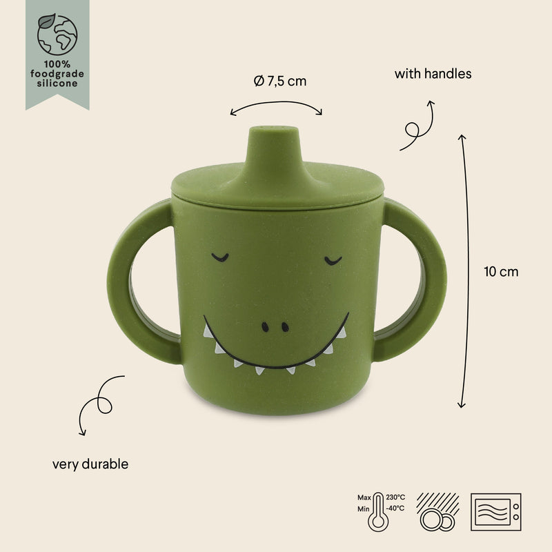 Green silicone sippy cup with dinosaur face and big handles for toddlers aged 4 months and up