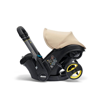 Doona i Infant Car Seat Stroller + ISOFIX Base - Sahara Sand