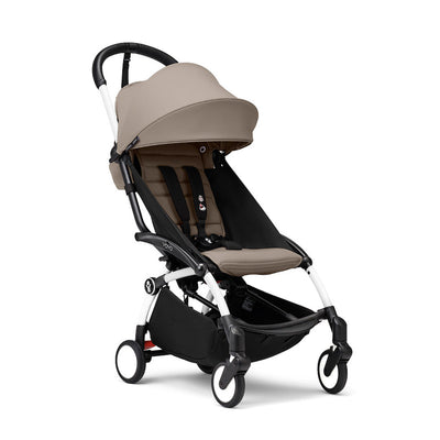 Stokke YOYO3 stroller in taupe for children from 6 months, compact and foldable design with extended canopy and storage basket.